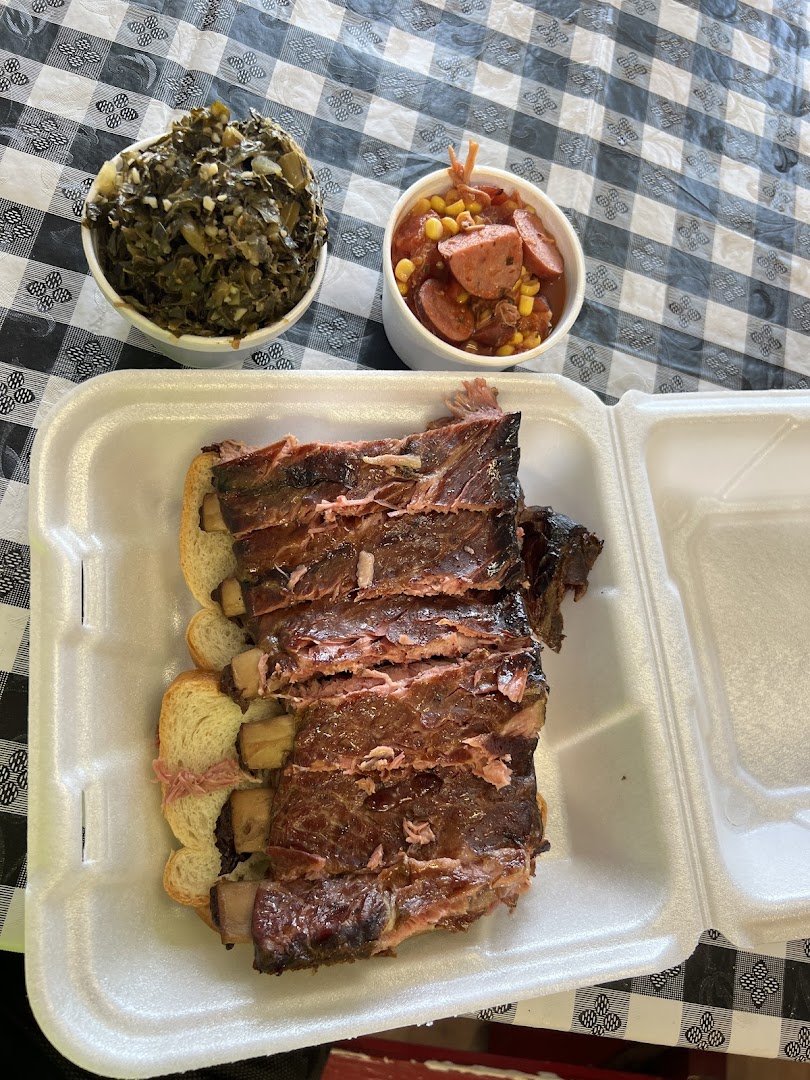 Smoked ribs on a barbecue tray.
